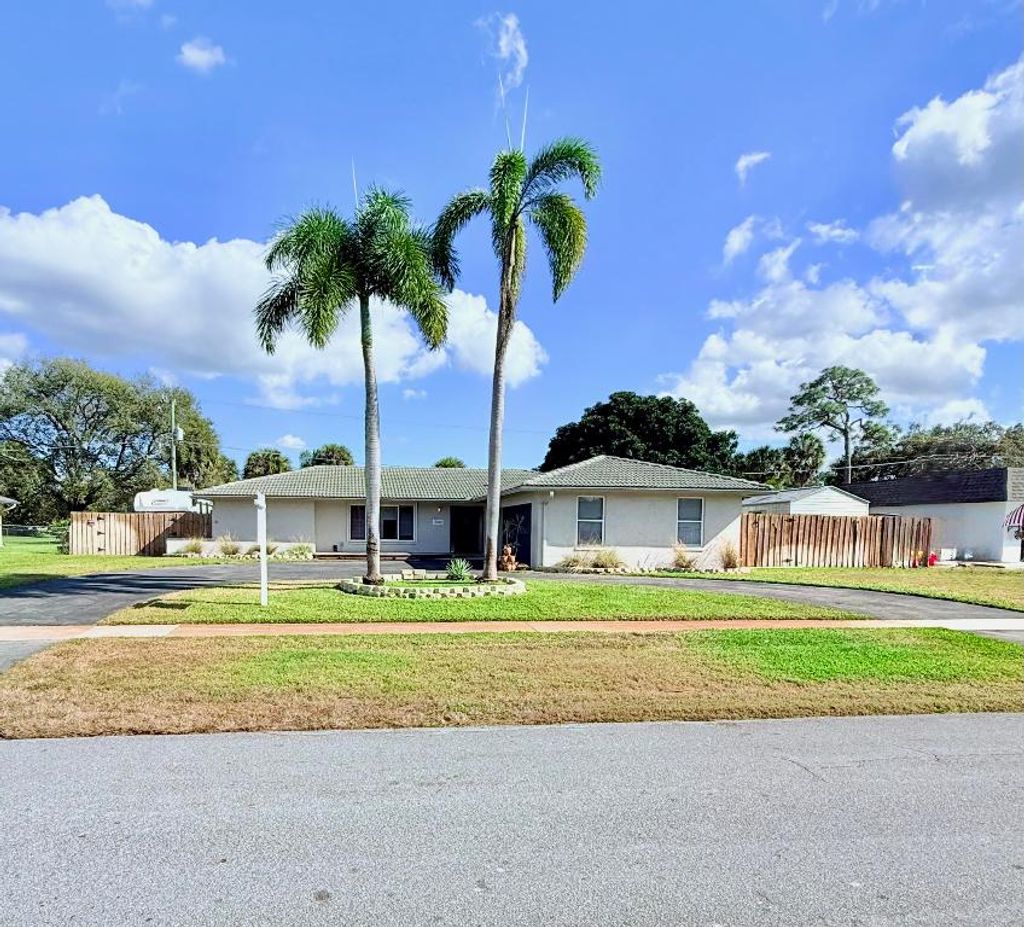 Photo of 3360 Pebble Beach Drive, Lake Worth, FL 33467 (MLS # R11152769)