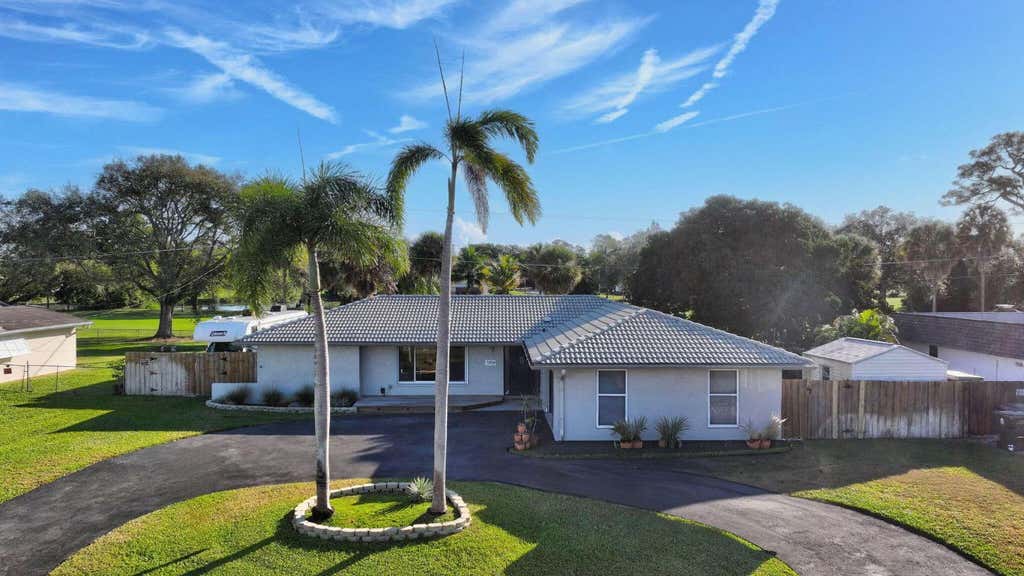 Photo of 3360 Pebble Beach Drive, Lake Worth, FL 33467 (MLS # R11152769)