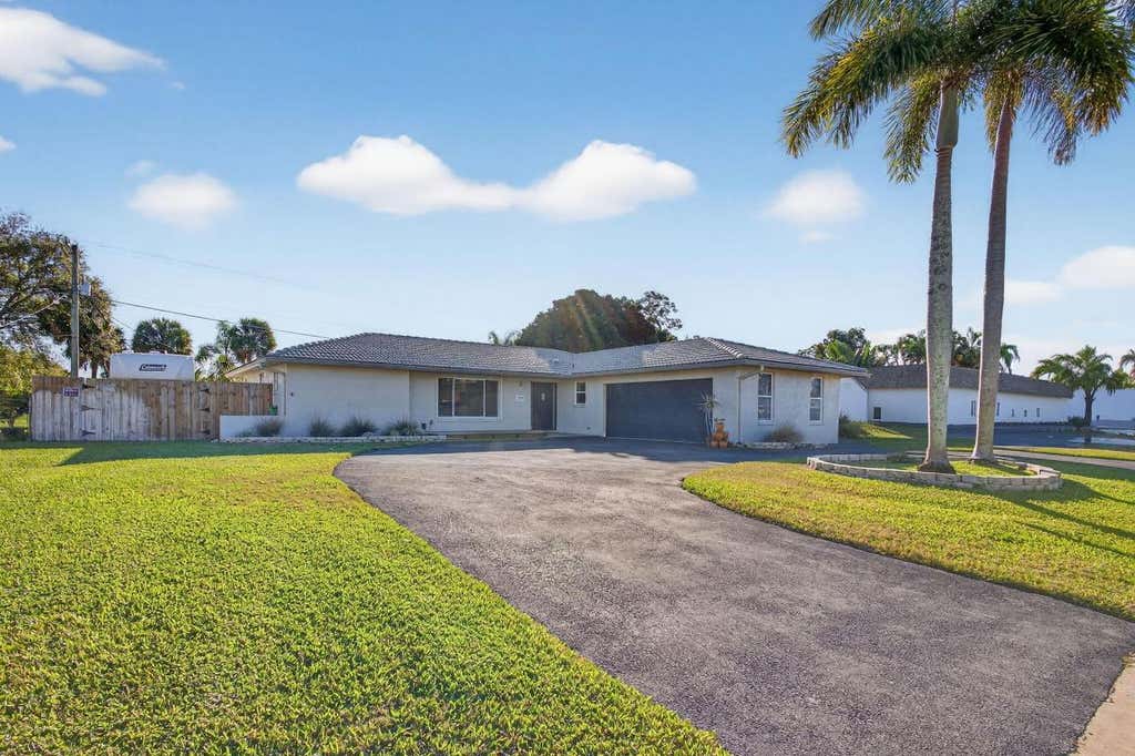 Photo of 3360 Pebble Beach Drive, Lake Worth, FL 33467 (MLS # R11152769)