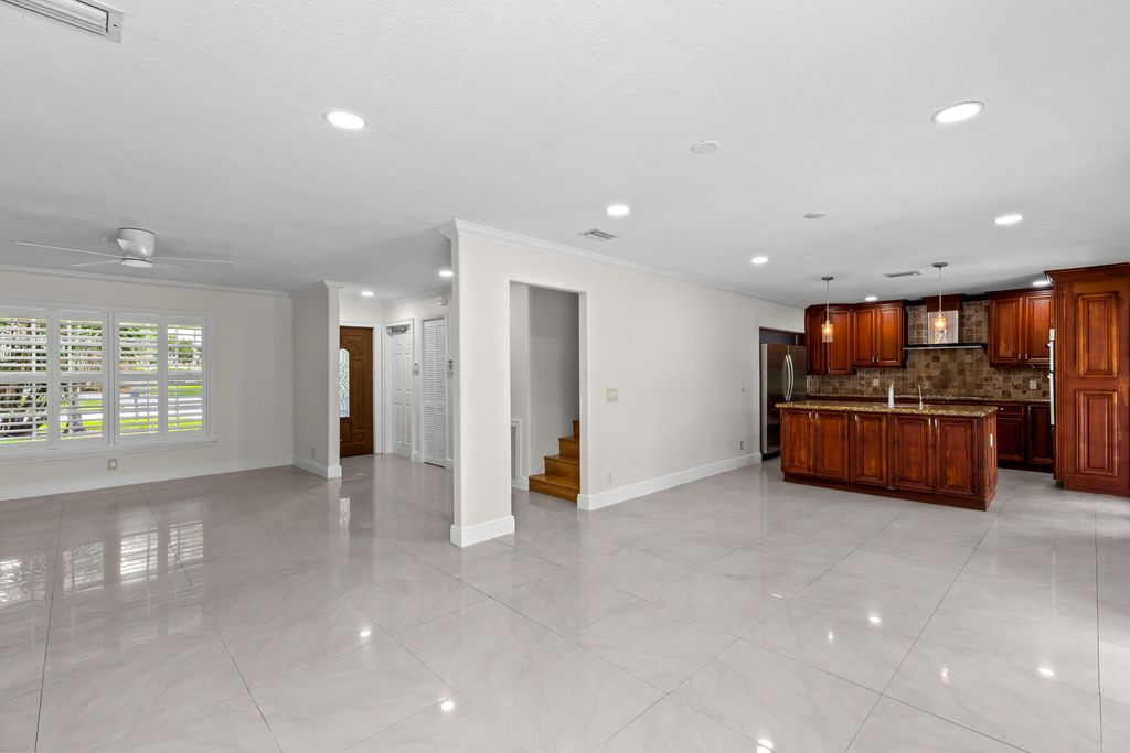 Photo of 4610 Pinetree Drive, Delray Beach, FL 33445 (MLS # B26034779)