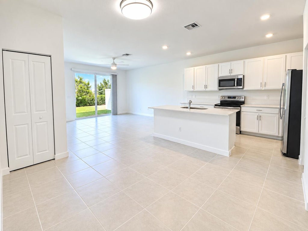Photo of 321 SE CROSSOAK Lane, Port Saint Lucie, FL 34984 (MLS # B26074884)