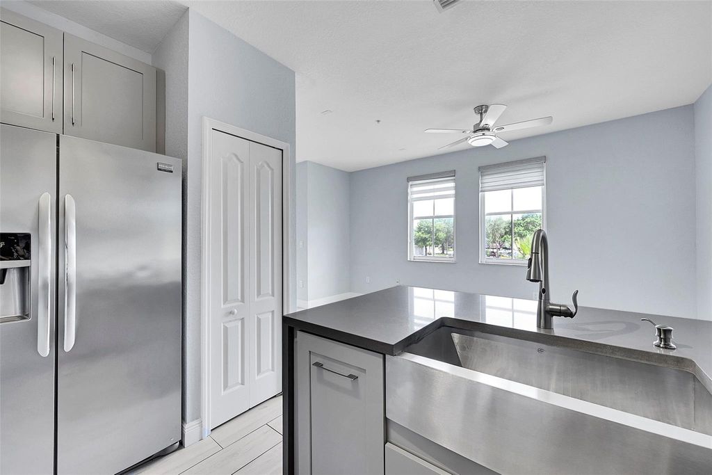 Photo of 150 Jacaranda Country Club Dr #200, Plantation, FL 33324 (MLS # F10542907)