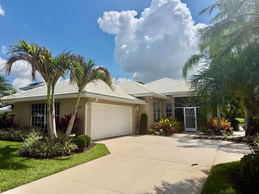 Luxury waterfront living in the heart of St. Lucie West! This beautifully updated 3-bedroom pool home offers breathtaking golf and water views. The open-concept design featuring elegant bamboo flooring, granite countertops, dream kitchen with newer stainless steel appliances,  a luxurious master suite with a spa-inspired bathroom. Enjoy entertaining in the formal dining room and spacious living room. Relax by the oversized backyard oasis featuring a large pool and covered patio while enjoying panoramic scenery that never gets old. Florida living at its finest!