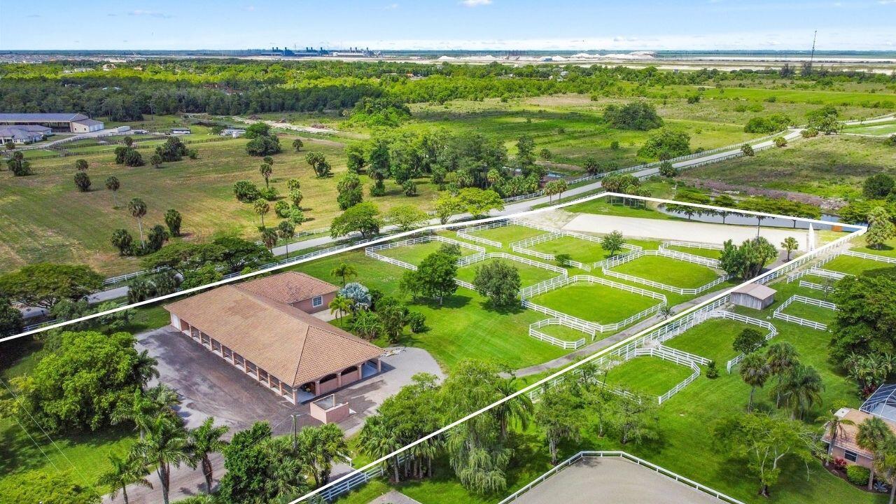 Move-in ready, turnkey 5 acre farm in White Fences. Brand new JTWG fiber arena with new mirror and irrigation pump. This CBS barn is a breezy beauty with 14 stalls (2 stallion) with 4 washstalls, mats and fly spray system, 8 large paddocks with new fencing, large a/c tack room, feed room and additional storage room, full barn bathroom and barn laundry. New well and RO system. Apartment has large open plan kitchen/dining area, with two bedrooms, and a shared full bathroom. Entrance is either via the barn, with two large laundry/cleaning storage rooms, or via the sunny French door facing the paddocks. Spacious asphalt parking/delivery area for plenty of cars and trailers, bridle path to arena. White Fences is a gated equestrian community with miles of trails. Located 10 miles north of WEF