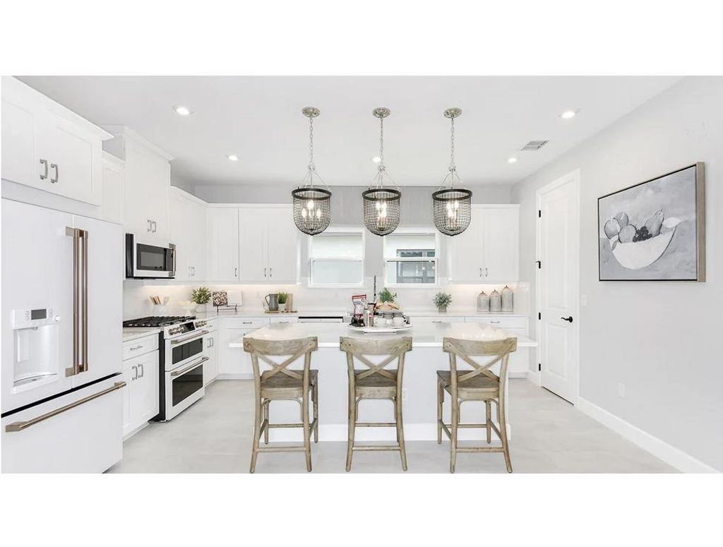 Photo of 9930 SW Arrezzo Road, Port Saint Lucie, FL 34987 (MLS # F10513820)