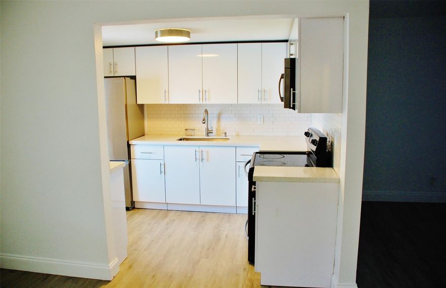 Located near the Turnpike and I95. Close to shopping and entertainment. This nice spacious 1 bed 1 bath condo has an updated kitchen with beautiful white cabinets/diamond-brite counter tops and stainless-steel appliances. A cozy dining area just beyond the entrance, large living room, and laminate floors throughout. It has a South facing screened patio. The bedroom features a large walk-in closet for wardrobe and a second closet for storage. There is additional storage on ground floor. A brand-new A/C unit replaced in 2024. Community pool and laundry room inside the complex. One assign parking space and guest parking. Low maintenance fees. If you are looking for a semiprivate community where you can relax and enjoy the surroundings come and check this one out. All ages community.