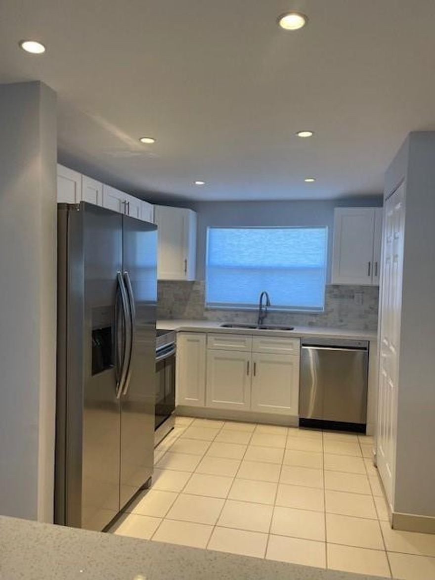 Move right in to this beautifully maintained 2BR/2BA FULLY RENOVATED condo ! Enjoy an updated kitchen with brand new stainless appliance package, new BATHS and GOOD SIZE closets. Patio converted into living space with impact windows overlooking canal, all from the comfort of the third floor. The community is known for its pristine grounds and fantastic amenities, offering the perfect blend of comfort, convenience, and lifestyle. great location in the community with no traffic noise and the building is maintained immaculately.  close and convenient to stores, banks, home depot! Cannot rent.  Elevator building. income and credit restrictions by HOA. 55+