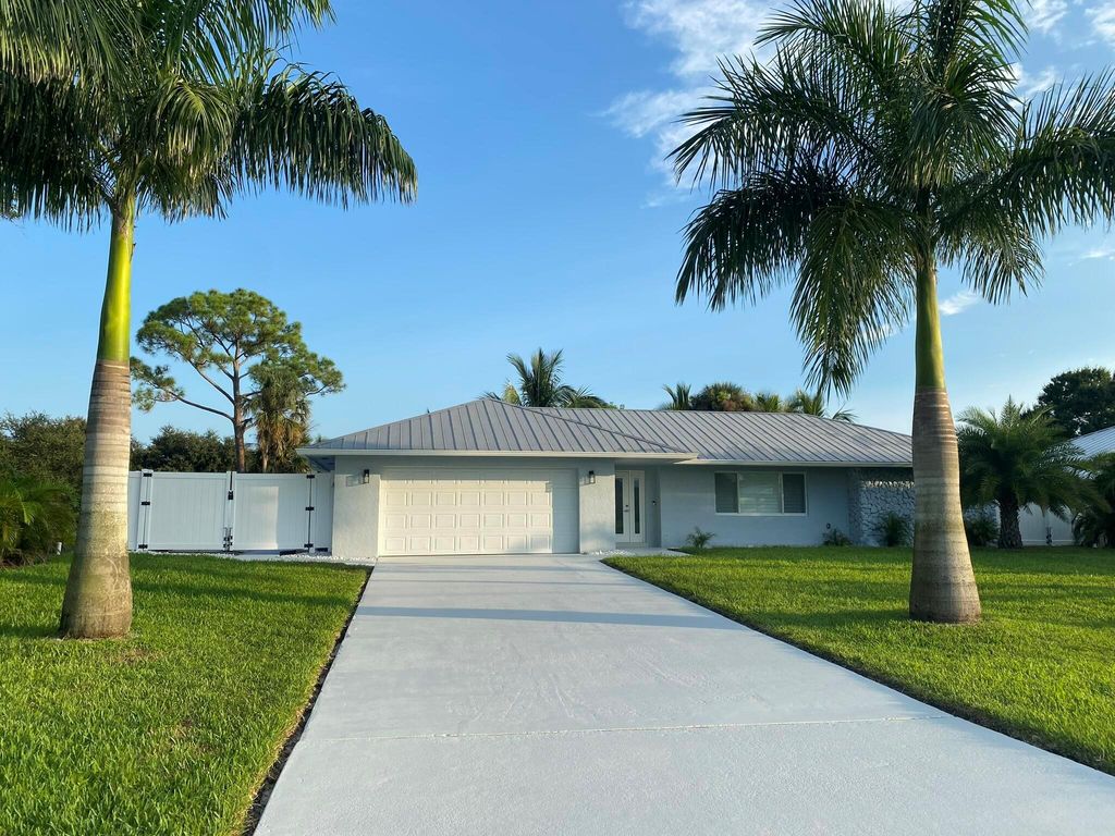 Photo of 135 NE Naranja Avenue, Port Saint Lucie, FL 34983 (MLS # R11048193)