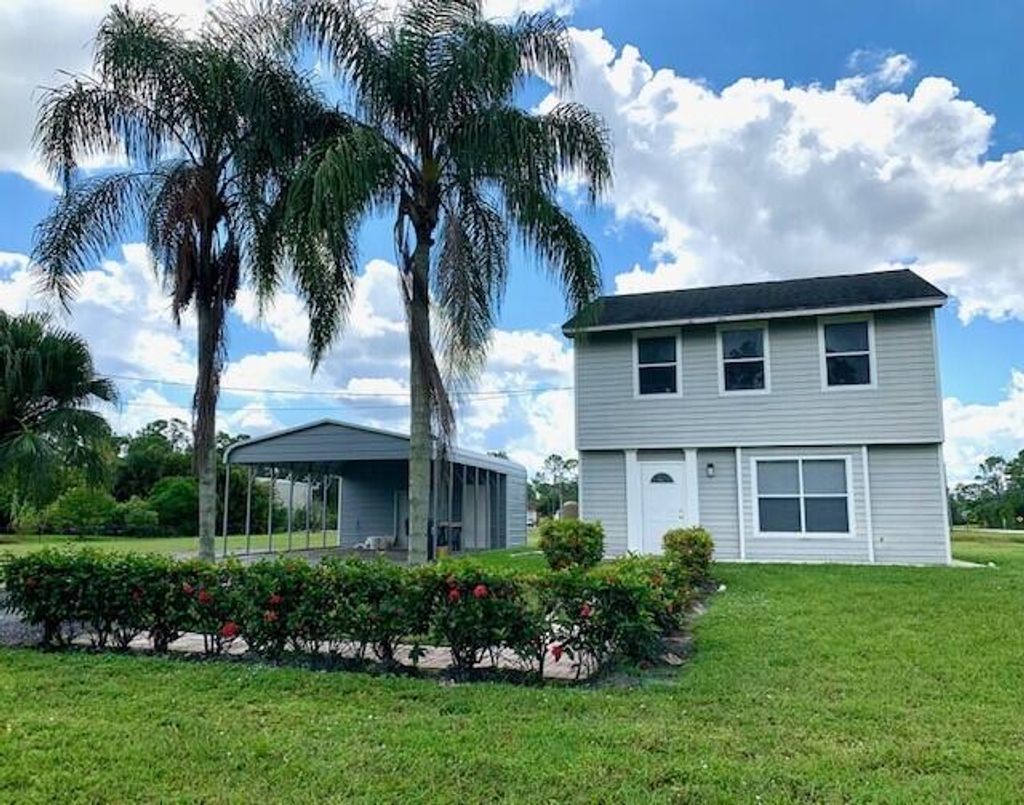 Photo of 13502 76th Road N, West Palm Beach, FL 33412 (MLS # R10850672)