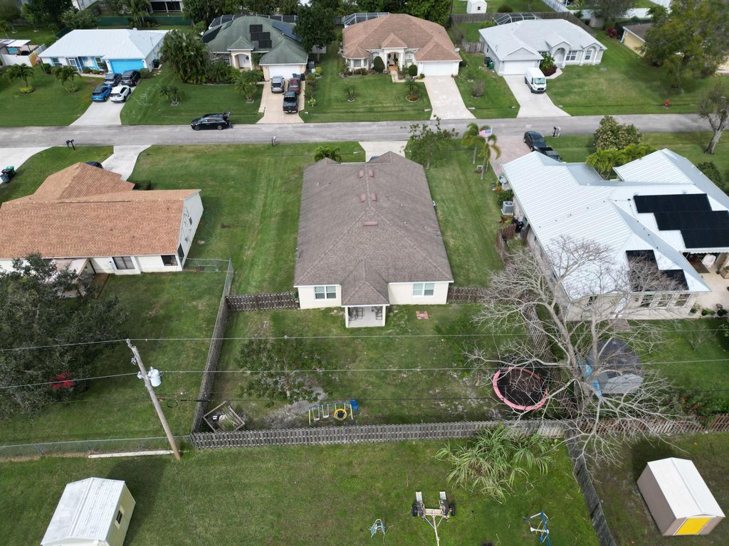 Photo of 1438 SW Dimperio Avenue, Port Saint Lucie, FL 34953 (MLS # R10952457)