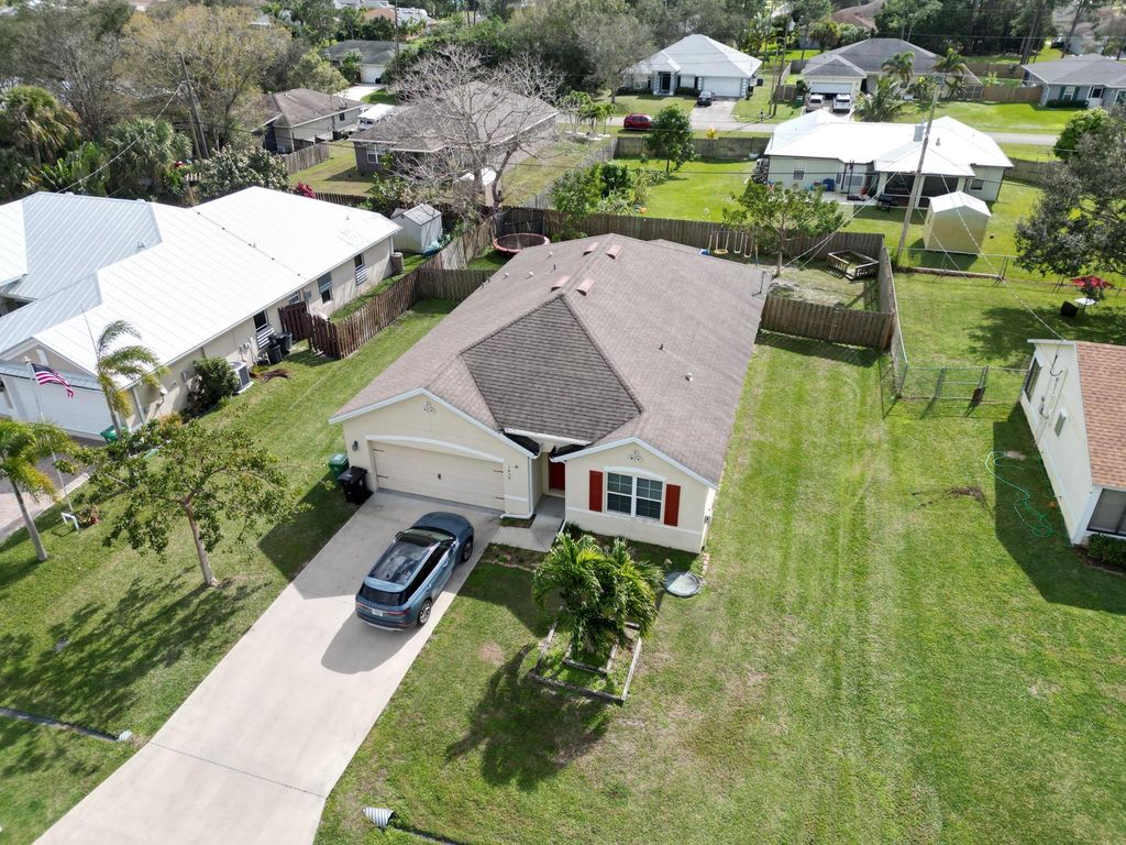 Photo of 1438 SW Dimperio Avenue, Port Saint Lucie, FL 34953 (MLS # R10952457)