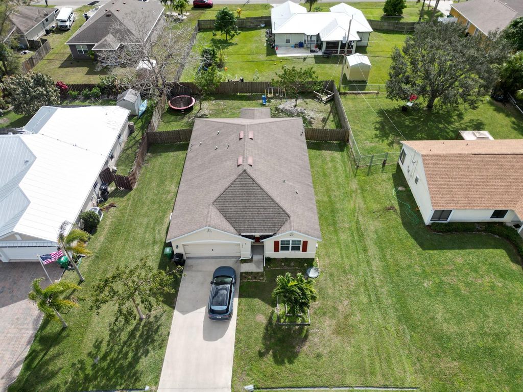 Photo of 1438 SW Dimperio Avenue, Port Saint Lucie, FL 34953 (MLS # R10952457)