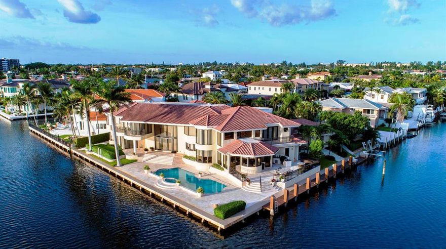 ONE OF A KIND, DOUBLE POINT LOT MASTERPIECE ON DEEP WATER, OVER 300-FT OF WATER FRONTAGE WITH NORTHEAST EXPOSURE.  THIS HOME HAS BEEN COMPLETELY RENOVATED WITH STATE OF THE ART FEATURES INCLUDING...1ST AND 2ND FLOOR MASTER SUITE, HURRICANE IMPACT GLASS, RESORT POOL & SPA, NATURAL GAS, GOURMET KITCHEN, SUMMER KITCHEN, LIBRARY, MOVIE THEATER, GYM. 3-CAR AIR CONDITIONED GARAGE. 48 KW GENERATOR, INCREDIBLE WATER WIEWS FROM EVERY ROOM !