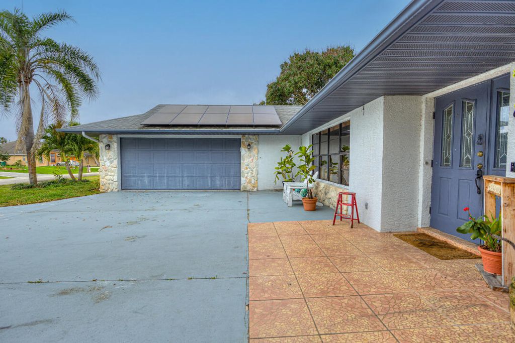 Photo of 641 NW Billiar Avenue, Port Saint Lucie, FL 34983 (MLS # R10966027)