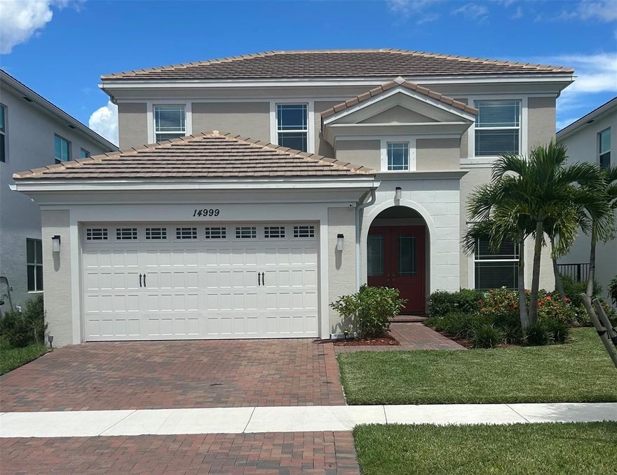 Welcome to this stunning, upgraded 4-bedroom, 3-bathroom Sycamore model by Minto, ideally situated on 
a premier lakefront lot in the heart of Westlake, Florida’s fastest-growing community. 
Step outside to enjoy breathtaking lake views from your spacious backyard and expansive L-shaped 
covered patio with a custom privacy wall—perfect for entertaining or relaxing in peaceful seclusion. The 
oversized lot offers ample space to design and build your dream pool, creating a private outdoor oasis 
tailored to your lifestyle. 
Inside, the home features a flexible floor plan with a formal dining room, bright sitting area/de n, and an 
inviting family room. The entire first floor showcases polished upgraded flooring, including the downstairs 
bedroom with direct access to a full bath and