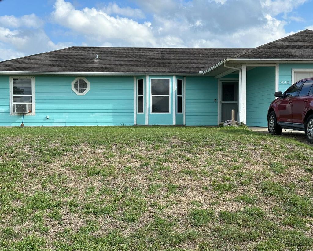 Photo of 442 SW Jeanne Avenue, Port Saint Lucie, FL 34953 (MLS # R10993534)