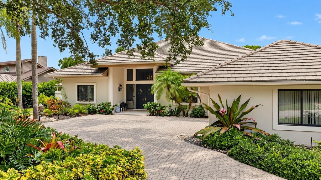 Photo of 6460 SE Winged Foot Drive, Stuart, FL 34997 (MLS # B26015358)