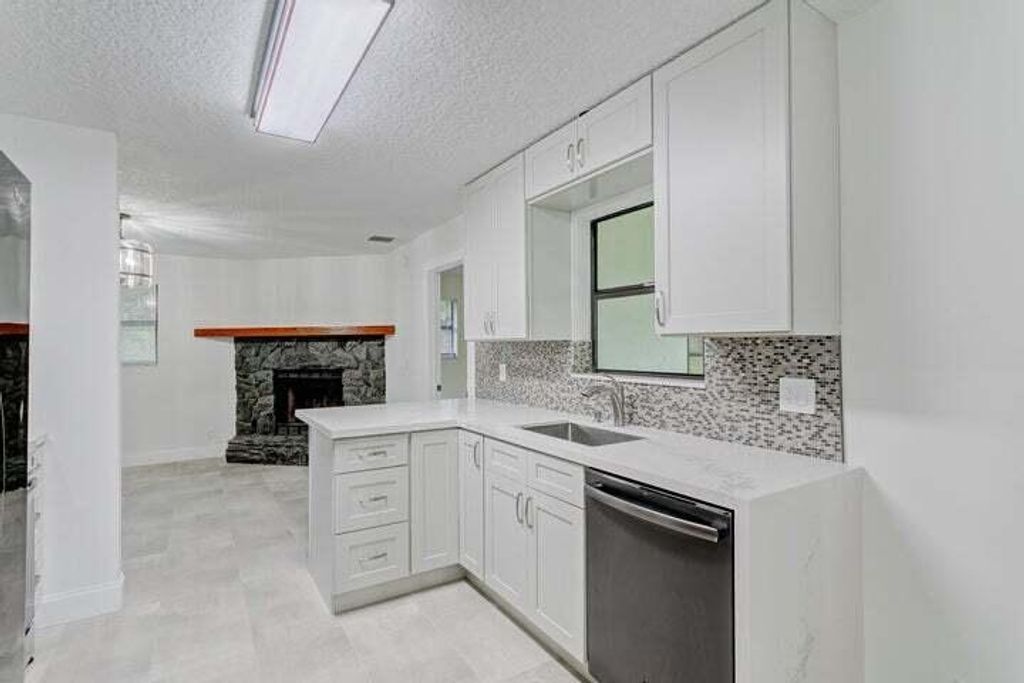 Photo of 16141 E Harlena Drive E, Loxahatchee, FL 33470 (MLS # R11037358)