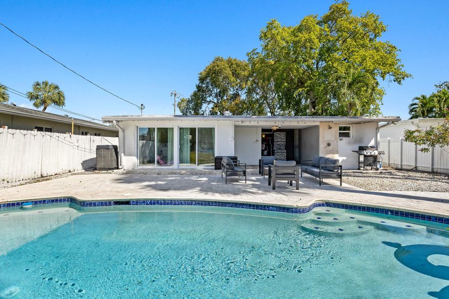 This Desirable Riverside Park Gem with Great Income Track Record features 3beds/3baths, pool and great location. Currently operating as an active and certified Airbnb, this property is ideal for investors or primary residence seekers due to its great upkeep and location. The roof was replaced in 2019, and the home features newer AC, water heater, electrical panel and High-impact Windows/Doors. Enjoy the Outdoor Oasis with a newly resurfaced swimming pool surrounded by Italian Travertine pavers and the big backyard perfect for relaxation and entertaining. This property is close to the Port, Downtown FLL, Las Olas, FLL Airport and major highways. With just a 15-minute drive to the Hard Rock Hotel and Casino, this is truly the ultimate vacation spot.