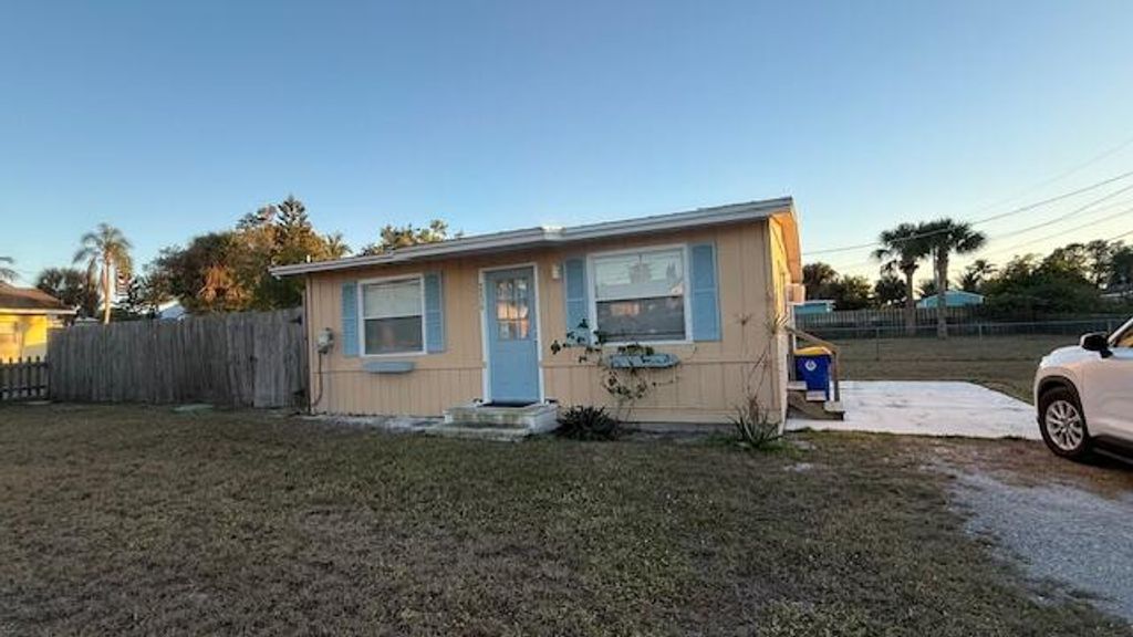 Photo of 2234 NE Pine Ridge Street, Jensen Beach, FL 34957 (MLS # R11152722)