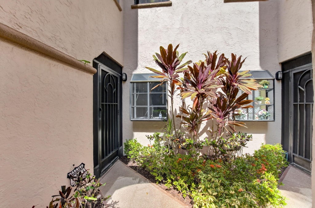 Photo of 5187 Europa Drive #F, Boynton Beach, FL 33437 (MLS # B26056031)