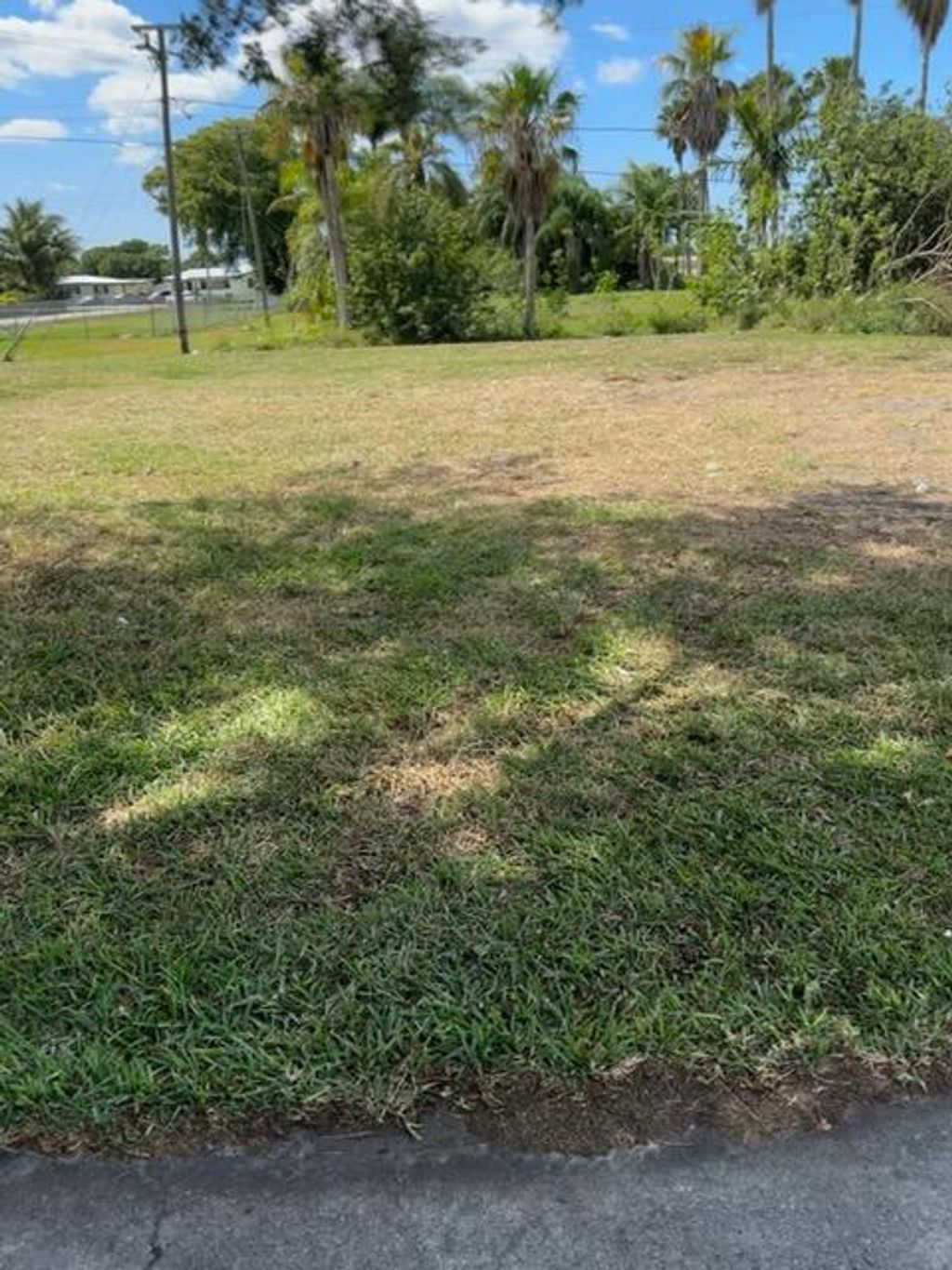 Photo of 501 W Baines Terrace, Pahokee, FL 33476 (MLS # R11158782)