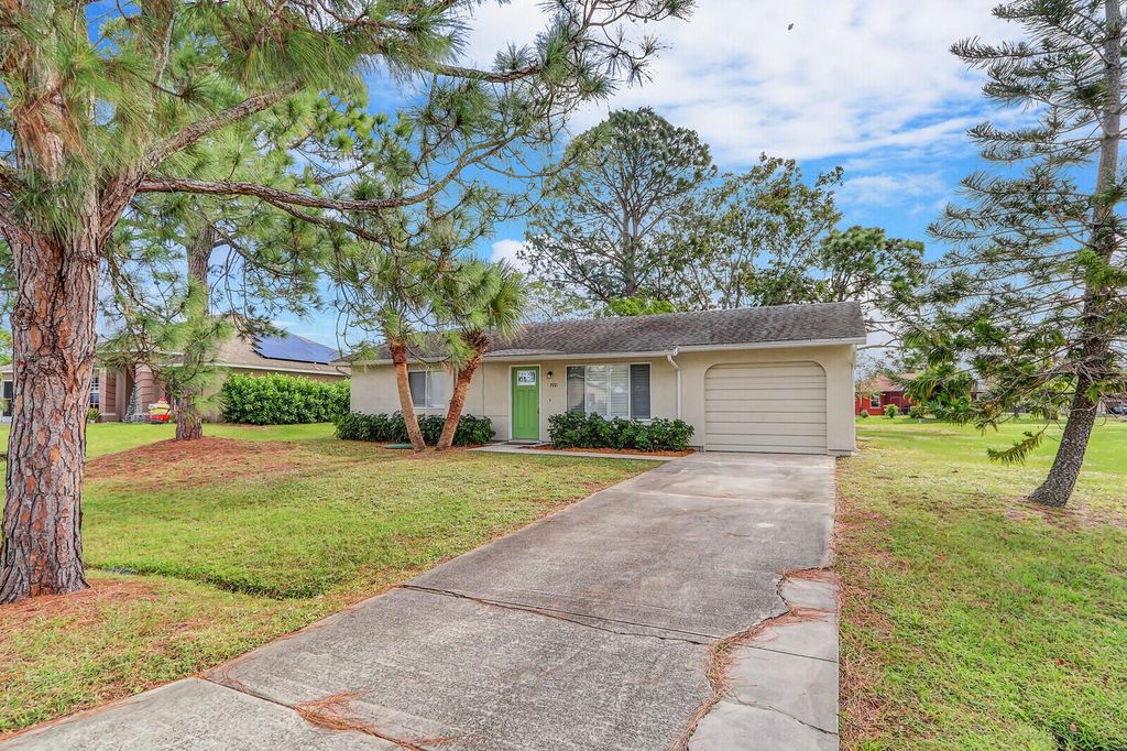 Photo of 1551 SE Flintlock Road, Port Saint Lucie, FL 34952 (MLS # R10942983)