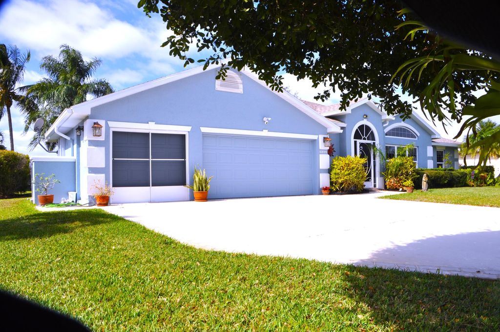 Photo of 6691 Dickinson Terrace, Port Saint Lucie, FL 34952 (MLS # R10957047)