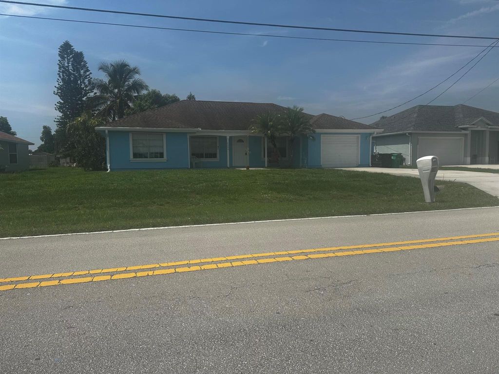 Photo of 2226 SE Tiffany Avenue, Port St Lucie, FL 34952 (MLS # R11105798)