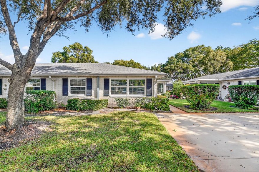 Welcome to your own slice of paradise. This stunning beautifully cared-for FULLY FURNISHED home offers a thoughtful blend of comfort, style and function. With 2 spacious bedrooms (primary bedroom with Nautica brand furnishings and king size bed with Sleep Number mattress) and 2 full baths, every detail has been meticulously updated to create a true sanctuary. There is also a glass enclosed Florida room/lanai which can function as additional living space.  This home is adorned with IMPACT WINDOWS & DOOR, NEW PLUMBING, FRESHLY PAINTED INTERIOR, NEW ROOF - 2024 and TILE ON DIAGONAL. The remodeled kitchen is a showstopper with solid surface counters, real wood cabinetry, SS appliances and soft close cabinets. This home is the perfect mix of relaxed Florida living and modern convenience.