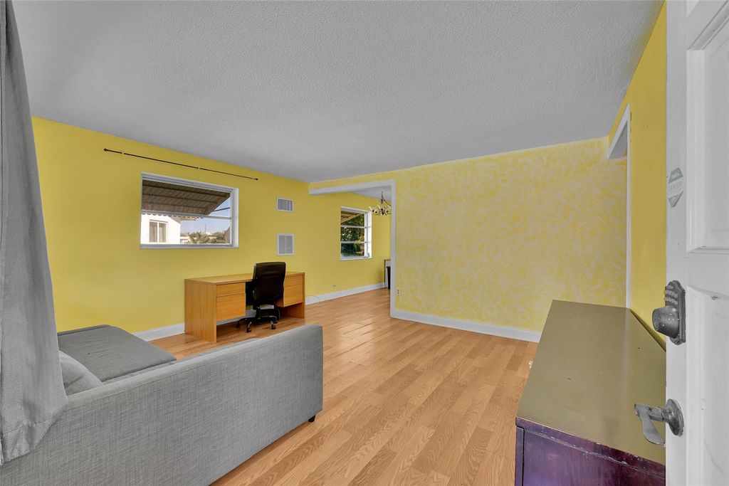 Photo of 2704 NW 48th St, Fort Lauderdale, FL 33309 (MLS # F10538035)