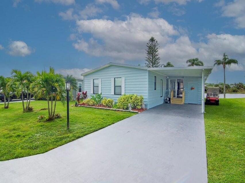 COME AND SEE this beautifully UPDATED WATERFRONT home in the 55+ community of Pinelake Gardens! This home has all new floors, appliances, bathrooms, lighting, new generator, garbage disposal, golf cart with new charger and a NEW ROOF! Enjoy waterfront sunsets from your back patio Schedule your private showing today!