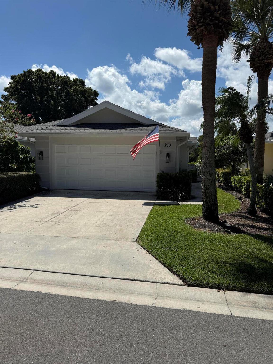 Welcome home to Divosta-built Villa to the very sought after ''Greenbrier'' on Golf Club of Jupiter (aka Indian Creek Golf Course). This 2- bedroom, 2- bathroom, 2- car garage Villa is situated on the 11th Green and boasts significant recent upgrades: 2023 AIR CONDITIONER, water heater, stove, microwave, dishwasher, refrigerator, garbage disposal, new faucets in kitchen and bathrooms, new flooring and window shades. NO polybutylene pipes! Come home and relax on the oversized screened patio! (more pics to come)
