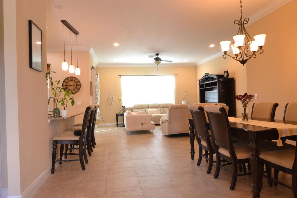Photo of 9995 SW Ambrose Way, Port Saint Lucie, FL 34986 (MLS # R11052856)