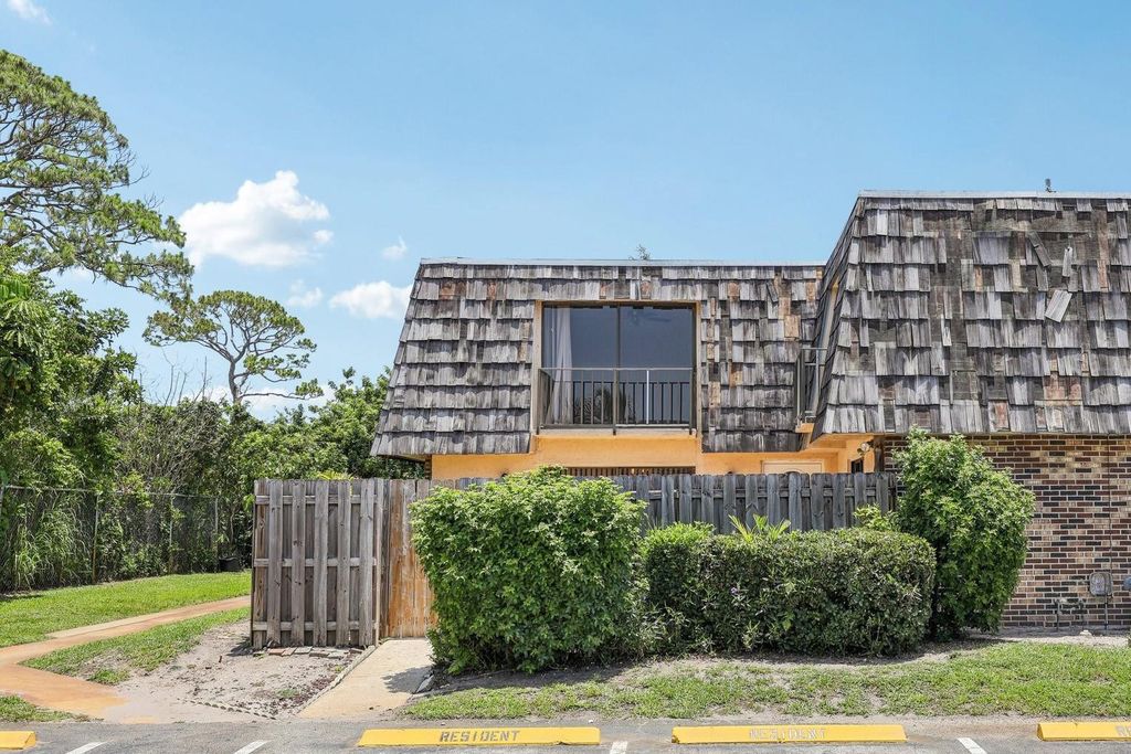 Photo of 1660 Forest Lakes Circle #D, West Palm Beach, FL 33406 (MLS # F10502501)