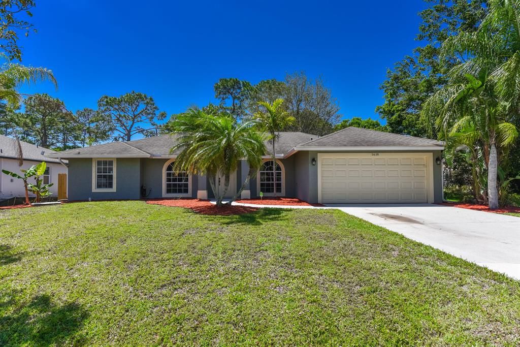 Photo of 1618 SW Davis Street, Port St Lucie, FL 34953 (MLS # R10882878)