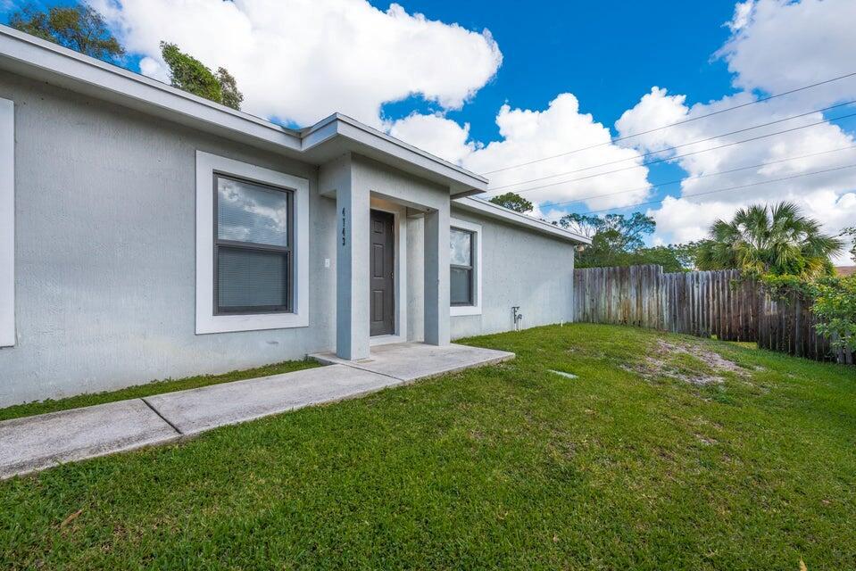 This beautiful 2017 construction house is packed with premium upgrades, including gorgeous granite countertops, sleek stainless steel appliances, and elegant ceramic tile flooring. Featuring 3 spacious bedrooms and 2 full bathrooms, this move-in-ready home offers comfort and convenience for the whole family. Plus, you'll be just minutes away from Palm Beach International Airport, Okeechobee Boulevard, popular shopping malls, and supermarkets--placing you at the heart of everything you need. Don't miss out on this incredible​​‌​​​​‌​‌​​​‌‌​​​‌‌‌​​‌​​‌‌​​​​ opportunity.