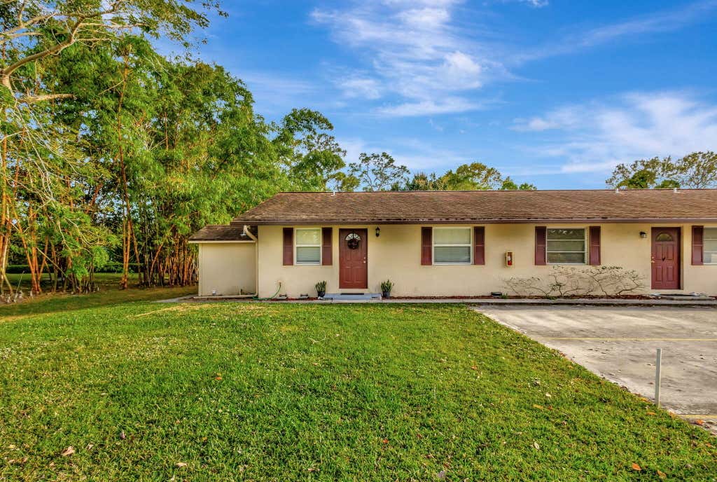Photo of 732 SW Gardens Boulevard, Palm City, FL 34990 (MLS # R11058056)