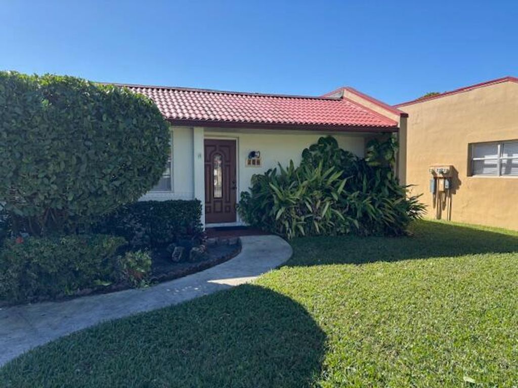 Photo of 104 Lake Barbara Drive, West Palm Beach, FL 33411 (MLS # R11160330)