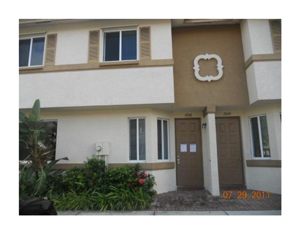 Photo of 1926 Hibiscus Lane, Riviera Beach, FL 33404 (MLS # R10743289)