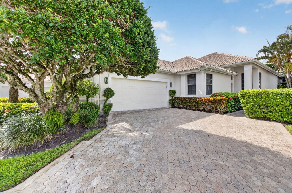 Photo of 2482 NW 63rd Street, Boca Raton, FL 33496 (MLS # B26062811)