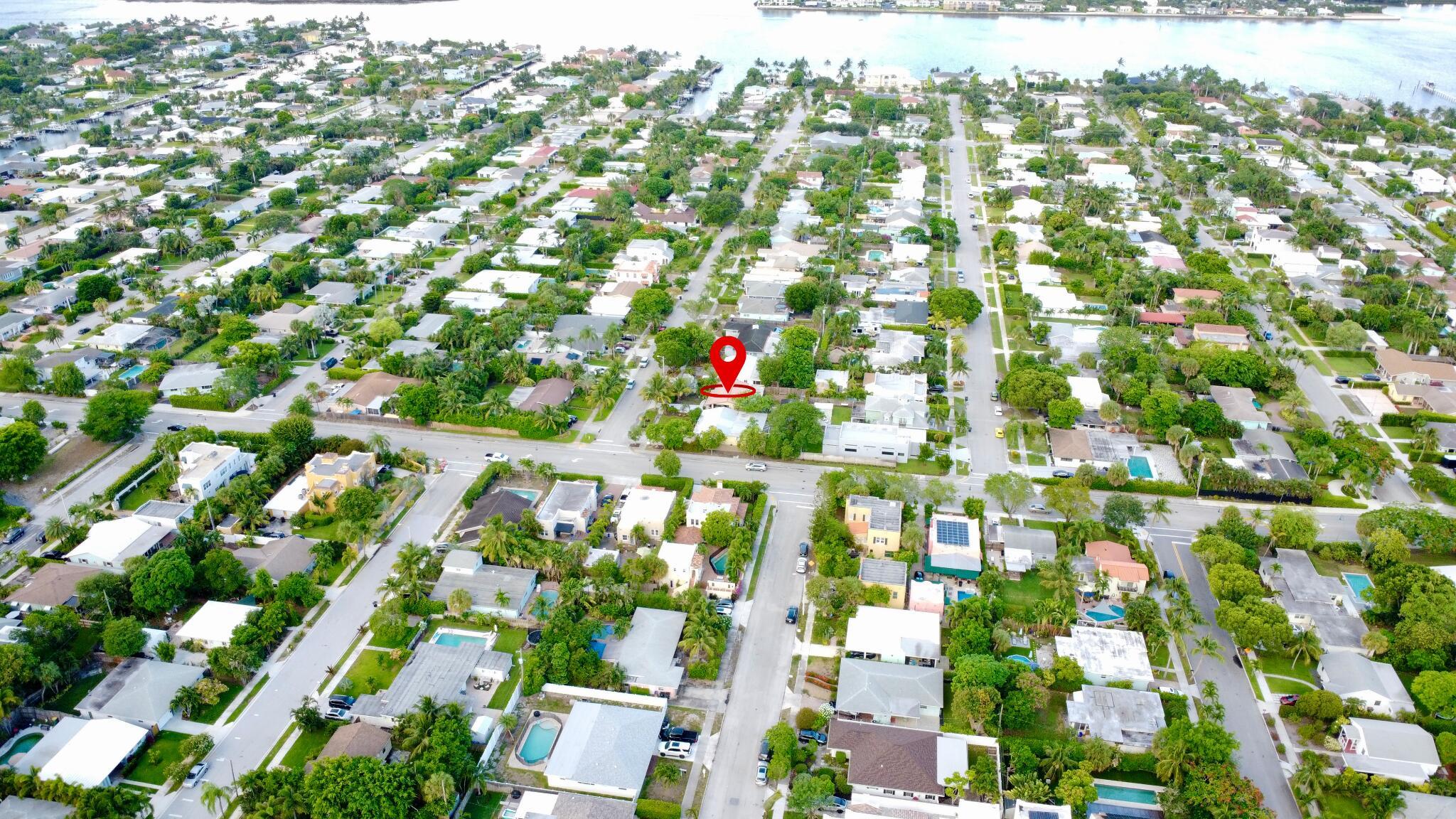 Unlock the potential of 183 Harvard Drive, located in the charming and historic College Park neighborhood of Lake Worth Beach. Just blocks from the Intracoastal Waterway and minutes from downtown West Palm Beach, this property offers exceptional access to world-class dining, white-sand beaches, the luxury shopping of Worth Avenue, and the booming financial district known as Wall Street South.This 2-bedroom, 2-bath mid-century home with a bonus room and enclosed patio sits on a spacious lot and features a separate detached structure in the rear--ideal for use as a guest suite, private office, rental space, creative studio, or workshop.