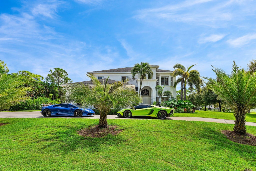 Photo of 6688 Duckweed Road, Lake Worth, FL 33449 (MLS # B26071742)