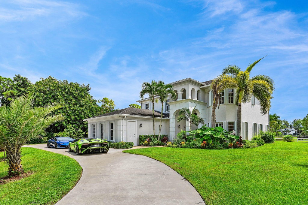 Photo of 6688 Duckweed Road, Lake Worth, FL 33449 (MLS # B26071742)