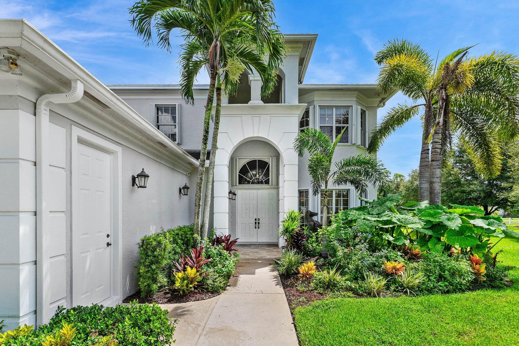 Photo of 6688 Duckweed Road, Lake Worth, FL 33449 (MLS # B26071742)