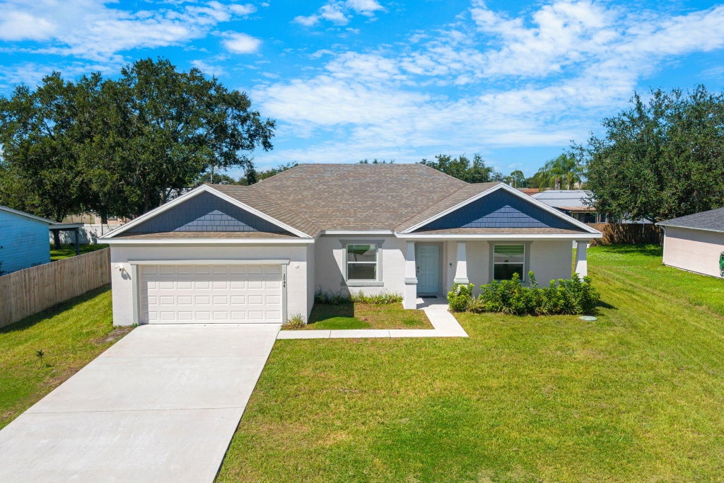 Photo of 2044 SW AMERICANA Street, Port Saint Lucie, FL 34953 (MLS # B26076205)