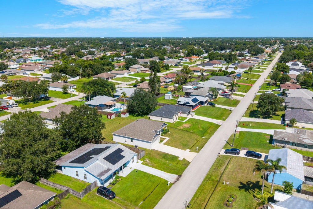 Photo of 2044 SW AMERICANA Street, Port Saint Lucie, FL 34953 (MLS # B26076205)
