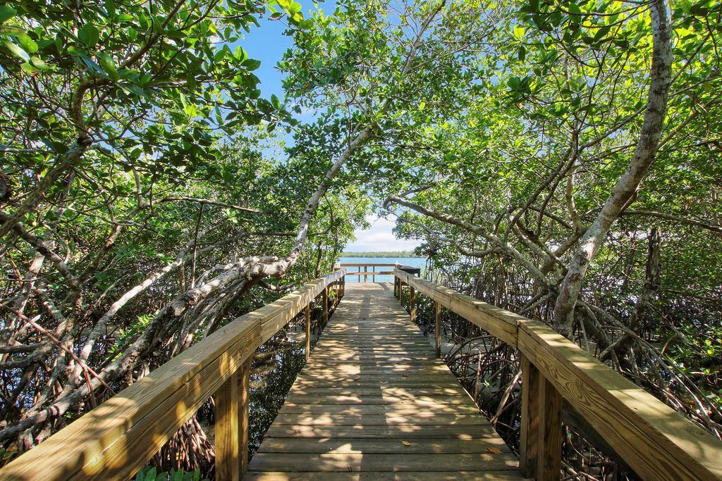 Photo of 5983 SE Riverboat Drive, Stuart, FL 34997 (MLS # R10950784)