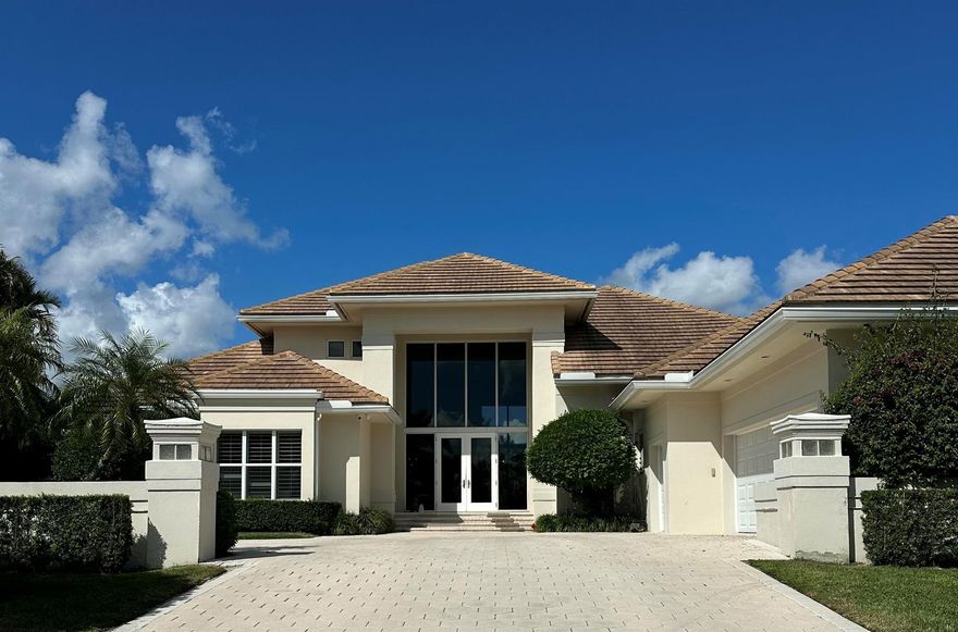 Magnificent 4BR + Office One-Story in Boca Grove!This stately home sits on a 1/2-acre private lot and features a brand-new salt water and spa pool, and turf grass, fully fenced, 2022 roof, hurricane-impact windows, and full-house generator. Enjoy volume ceilings, abundant natural light, and an open layout with spectacular backyard views.  Miele appliances, center island, and plenty of storage. The elegant living room with custom wet bar is perfect for entertaining. The primary suite includes his/her closets and a luxurious spa bath. Three guest suites each feature private baths. Outdoor living shines with a retractable awning, cabana bath, and spacious patio. Close to fine dining, shopping, and houses of worship--this residence has it all!