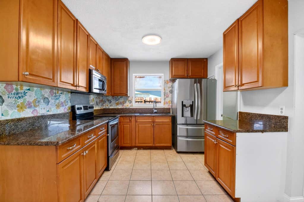 Photo of 775 Snead Circle, West Palm Beach, FL 33413 (MLS # B26017903)